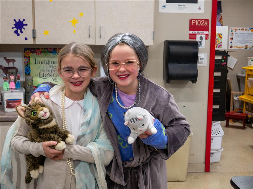 two girls dressed as 100 year olds
